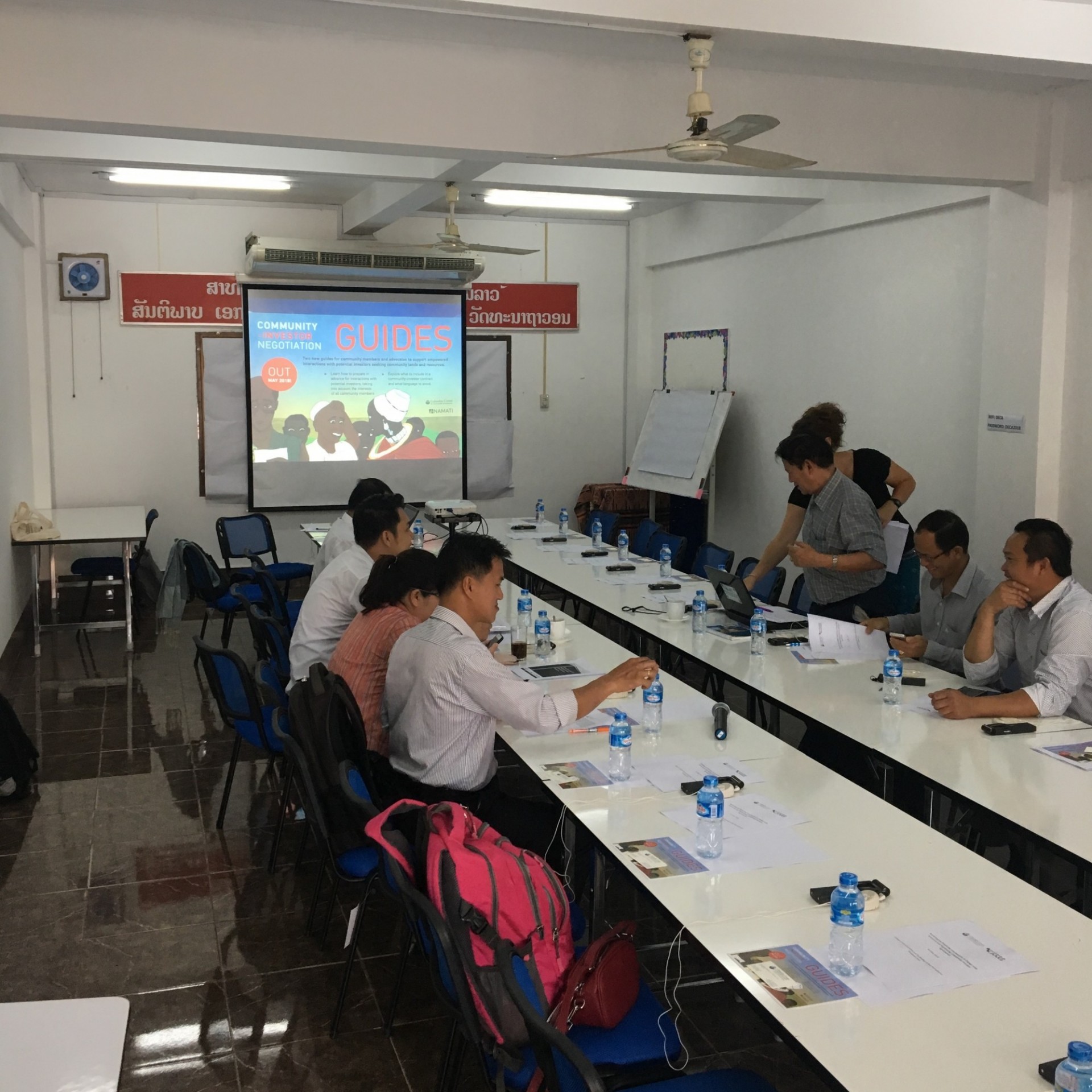 Guide validation at a 2018 CCSI-Land Information Working Group (LIWG) workshop on community-investor negotiations in Vientiane, Laos. Laos Image