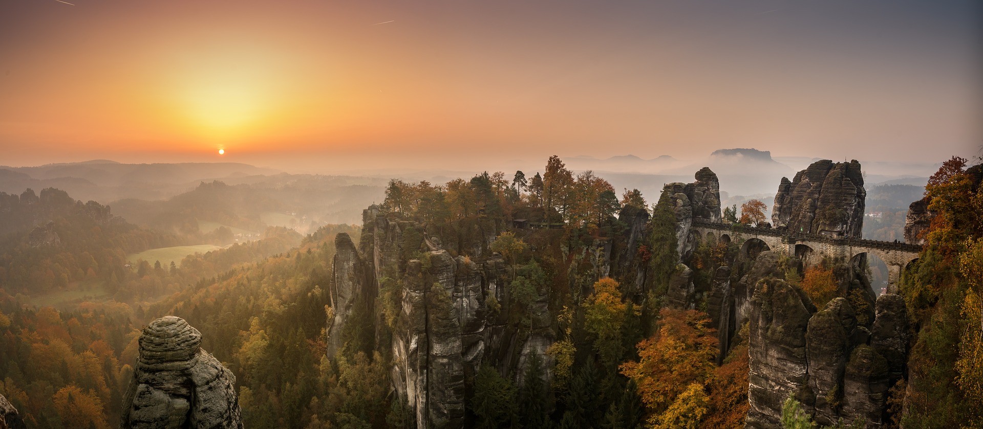 mountains in front of sunrise