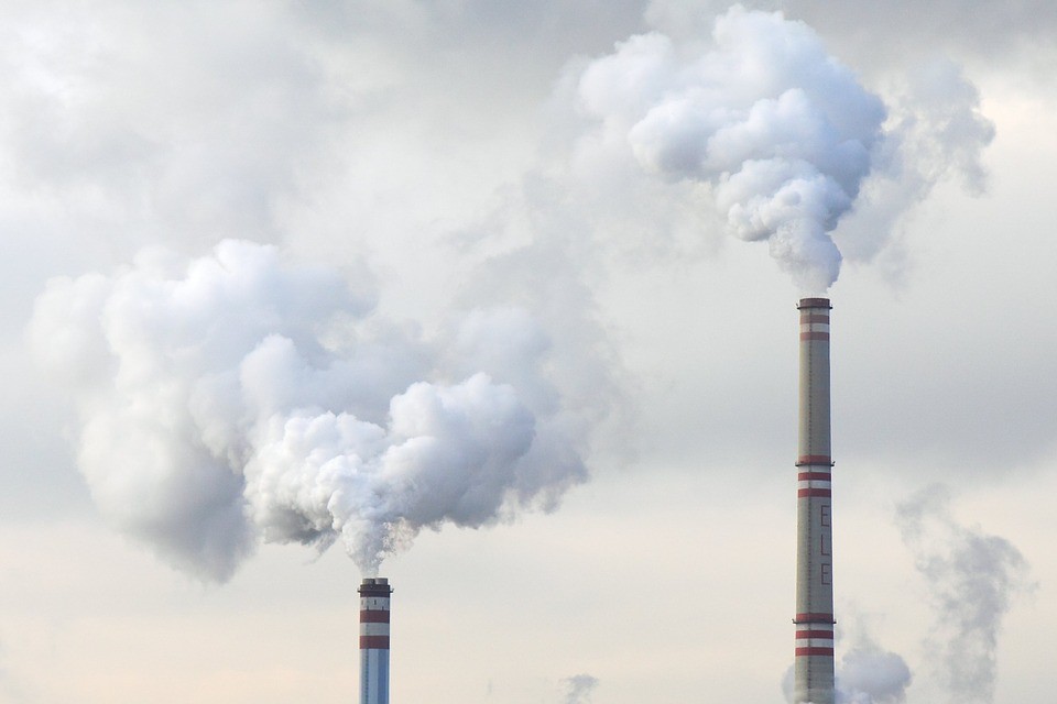 smoke coming out of two smokestacks